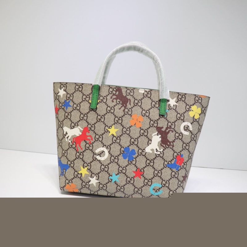 G*u*i shopping bags